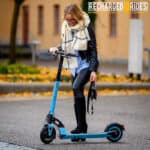 Woman Riding Scooter